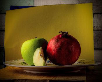 Close-up of apples on table