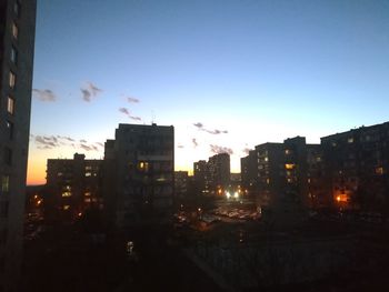 Modern buildings in city against sky