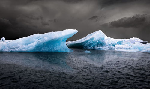 Scenic view of frozen sea against sky