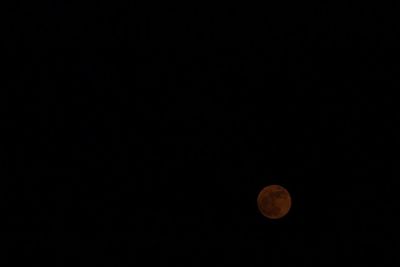 Scenic view of moon against sky at night