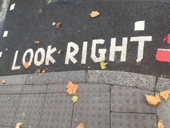 High angle view of text on street