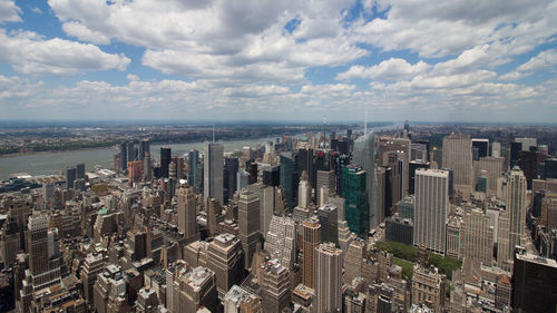 High angle view of modern buildings against sky in city