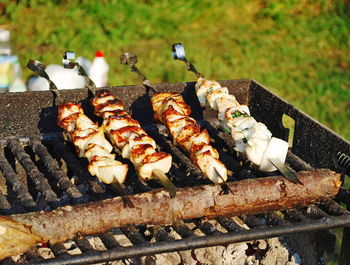 Close-up of meat on barbecue grill