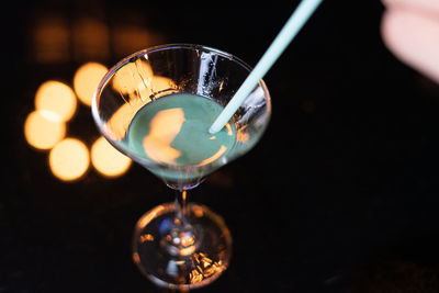 Close-up of wine in glass on table