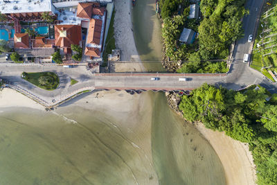 Aerial view of city by coastline