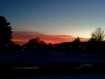 Scenic view of silhouette trees against sky during sunset