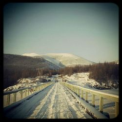 Road leading towards mountains