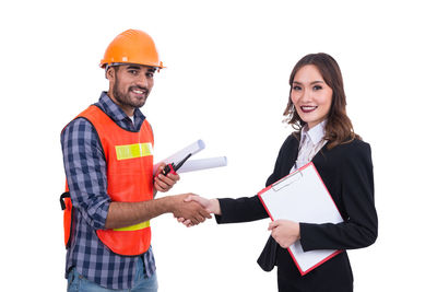 Young man working on white background