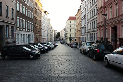 Cars parked in front of building