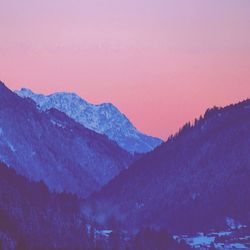 Scenic view of snow covered mountains