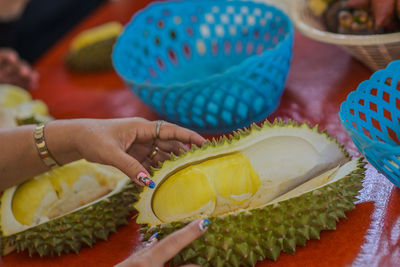 Close-up of woman holding food