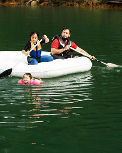 High angle view of people in boat on lake