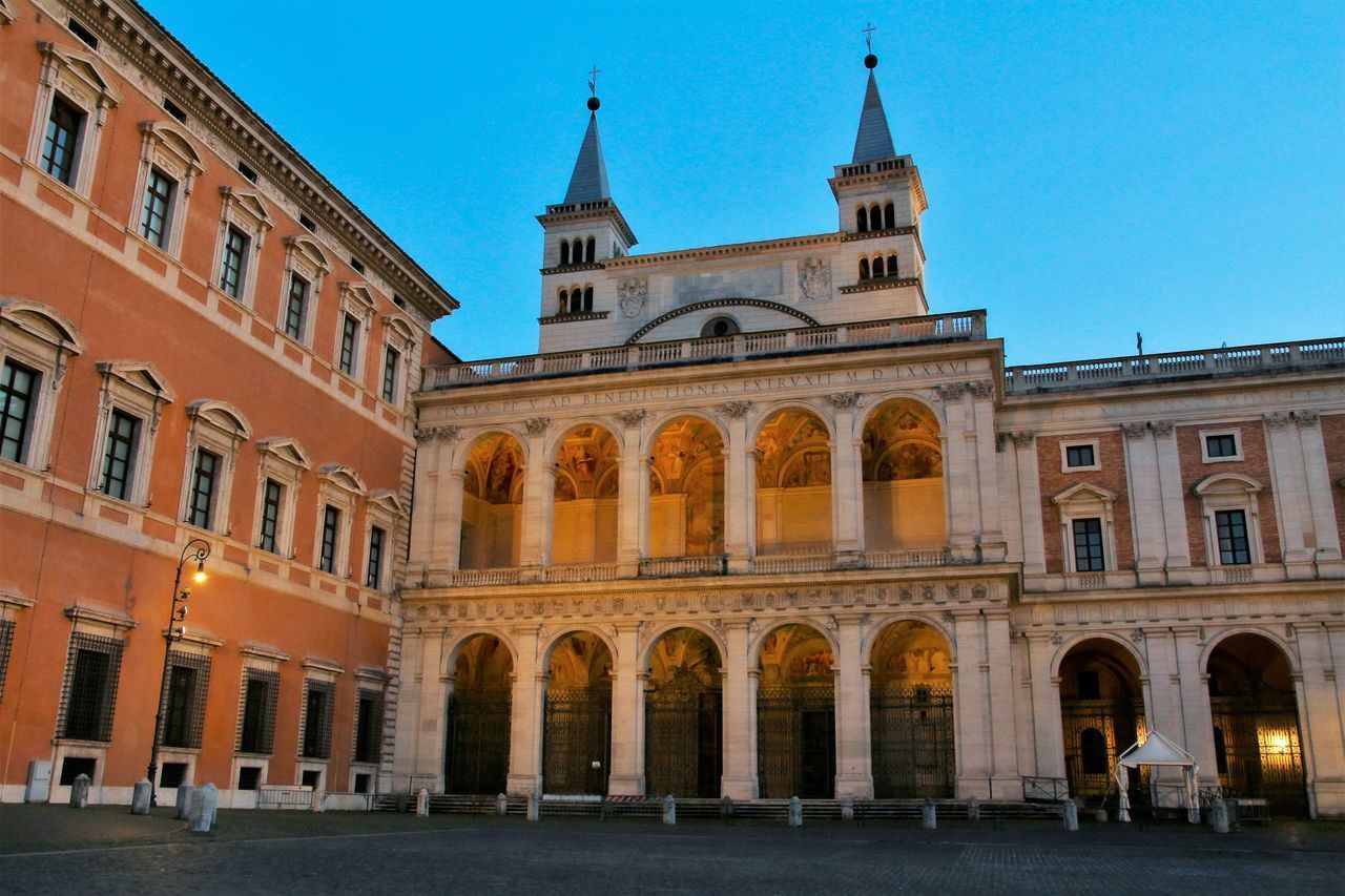 FACADE OF HISTORIC BUILDING AGAINST CLEAR SKY