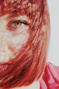 Close-up portrait of redhead woman