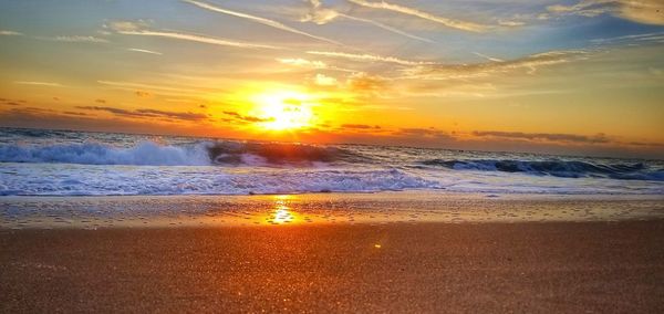 Scenic view of sea against sky during sunset