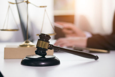 Close-up of human hand on table