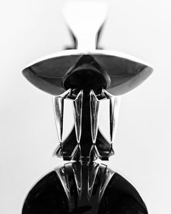 Low angle view of electric lamp against white background