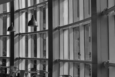 Low angle view of building seen through window