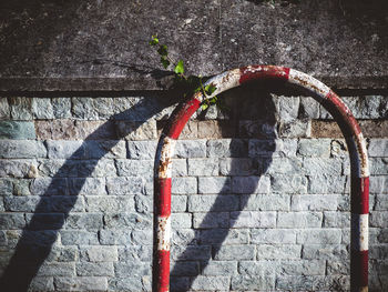 Shadow of red brick wall