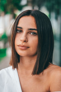 Close-up portrait of teenage girl outdoors