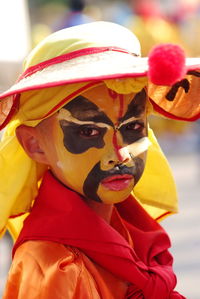 Close-up of boy wearing carnival costume