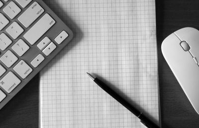 Close-up of pen on table