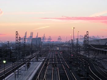 High angle view of railroad tracks against sky during sunset