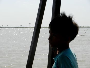 Man standing on pier