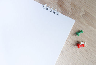 Low angle view of paper against clear blue sky