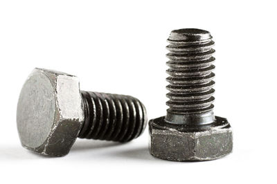 Close-up of metallic stack against white background