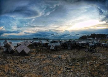 Scenic view of sea against cloudy sky