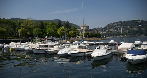 Boats moored at harbor