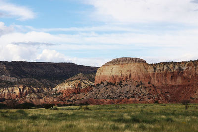 Scenic view of rocky landscape against sky