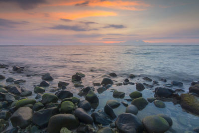 Scenic view of sea against sky during sunset