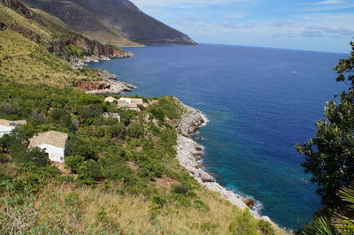 Scenic view of sea against blue sky