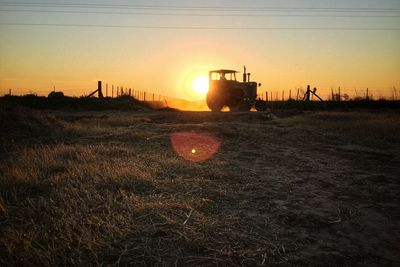 Scenic view of landscape at sunset