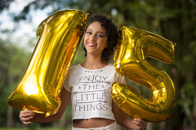 Portrait of smiling young woman