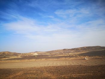 Scenic view of desert against sky