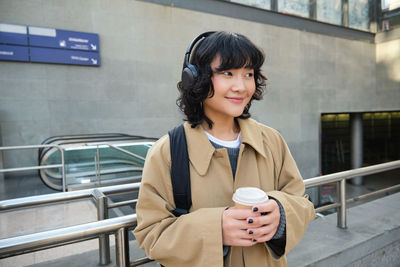 Young woman using mobile phone