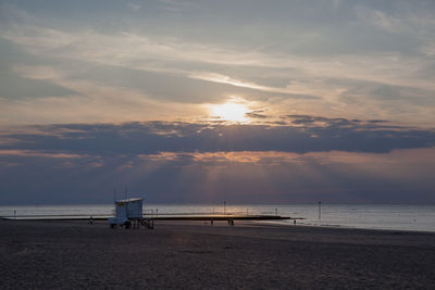 Scenic view of sea at sunset