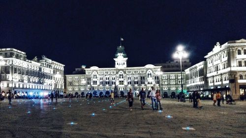 Tourists at night