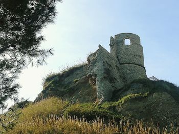 Low angle view of old ruin building