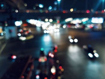 Defocused image of illuminated city street