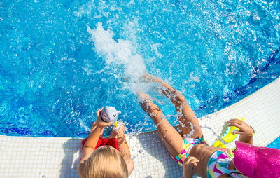 High angle view of people in swimming pool