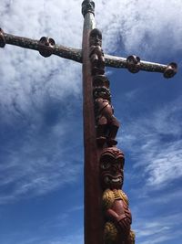 Low angle view of statue against sky
