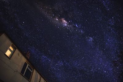 Low angle view of stars in sky at night