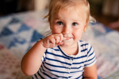 Portrait of cute baby at home