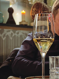 Close-up of wineglass on table