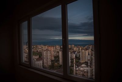 Buildings seen through window