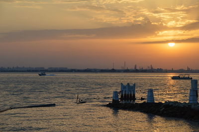 Scenic view of sea against sky during sunset